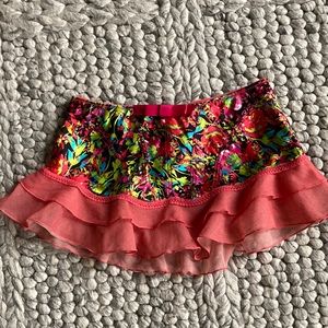Cassandra sexy, colorful “flirt skirt”